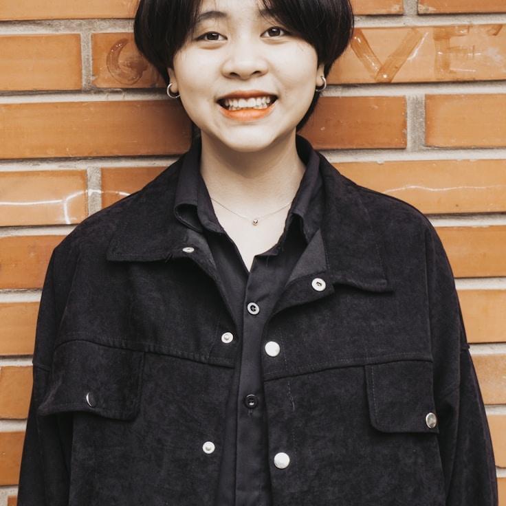 Kaveri Mehta, Lead Design Curator at Crypto Meliora, reviewing corporate floral arrangements